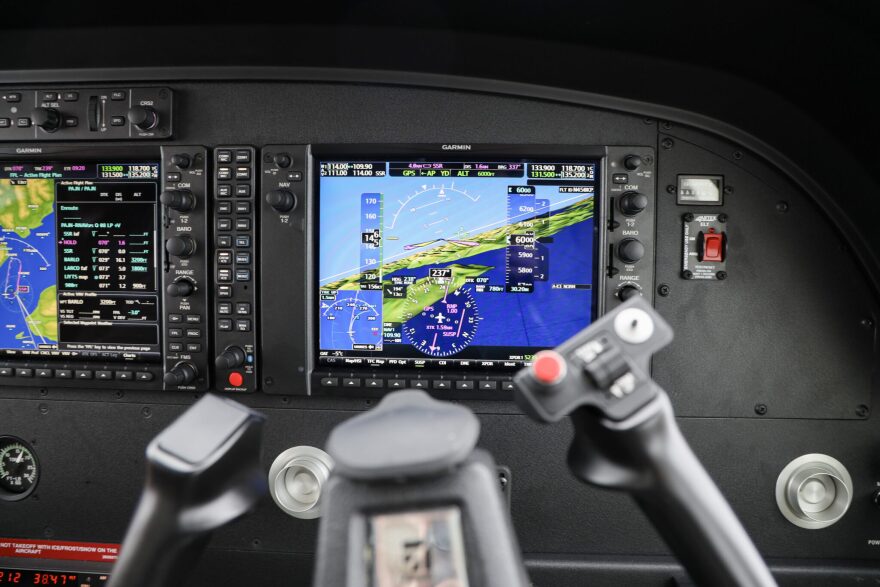 A screen in the cockpit displays a computer-generated 3-D view of the terrain, called synthetic vision.