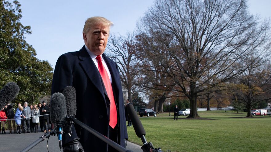 President Trump talks to reporters before boarding Marine One at the White House last week.