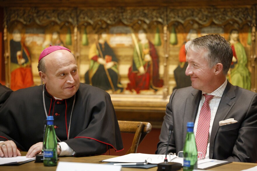Archbishop of Santiago de Compostela Francisco José Prieto Fernández of Spain, left, speaks to SMU President Jay C. Hartzell during a signing ceremony at the Meadows Museum, Tuesday, Oct. 7, 2025, in University Park, to collaborate in a major exhibition coming to the museum in February 2027.