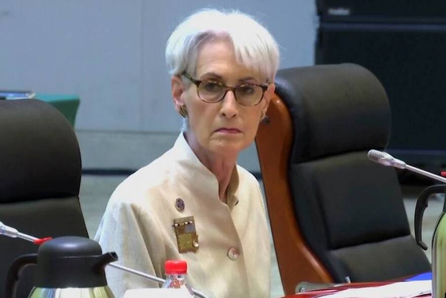 Image taken from a July 26, 2021, video footage run by Phoenix TV via AP Video, when U.S. deputy secretary of state Wendy Sherman looks up before talks with Chinese officials at the Tianjin Binhai No. 1 Hotel in the Tianjin municipality in China.