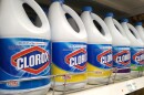 A row of bottles of Clorox bleach on a store shelf.