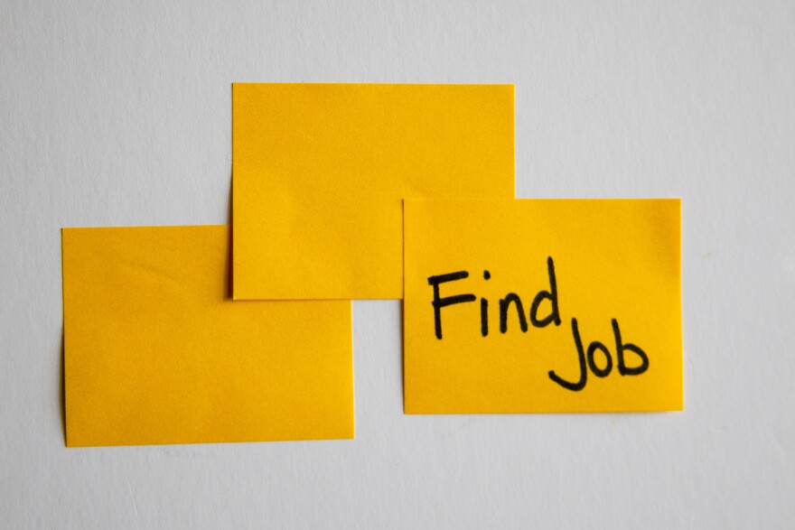 Image of sticky notes with one titled find job