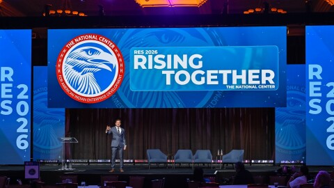 Man standing on stage for RES.