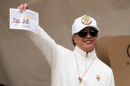 Colombian President Gustavo Petro shows a ballot during the runoff election in Bogota, Colombia, Sunday, June 21, 2026.