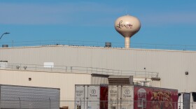 Trucks carrying Hillshire Farm goods are docked at the Tyson Foods beef processing plant in Lexington, Nebraska. The facility will close in January, and more than 3,200 people will lose their jobs.