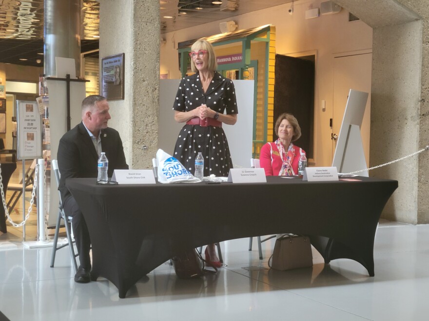 Lt. Gov. Suzanne Crouch speaks to Northwest Indiana tourism professionals, while South Shore CVA President/CEO David Uran and Indiana Destination Development Corporation Secretary and CEO Elaine Bedel listen, at the Indiana Welcome Center on July 26