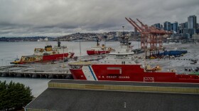 The U.S. Coast Guard icebreakers Polar Star (at background), Healy (at left) and Storis (at foreground) are seen together at Coast Guard Base Seattle on Oct. 26, 2025, marking the first time since 2006 that the Coast Guard had three active polar icebreakers in the same place at the same time.