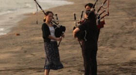 Women practicing bagpipes on a beach in Hong Kong, where the instrument has gained a loyal following. (File photo from October 2011)