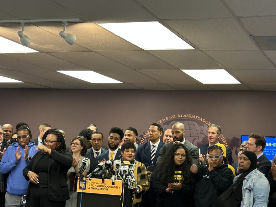 A cadre of government officials and community leaders joined the mayor in announcing public safety progress.