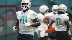 Miami Dolphins offensive tackle Bayron Matos (70) does drills at training camp before he was injured toward the end of practice onWednesday, July 23, 2025, in Miami Gardens.