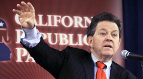 Economist Arthur Laffer, known as "the father of supply-side economics" and who was an economic advisor to President Ronald Reagan, speaks to an executive committee meeting of the California Republican Party at their convention in Anaheim, Calif., Friday, Oct. 4, 2013.  (Reed Saxon/AP)