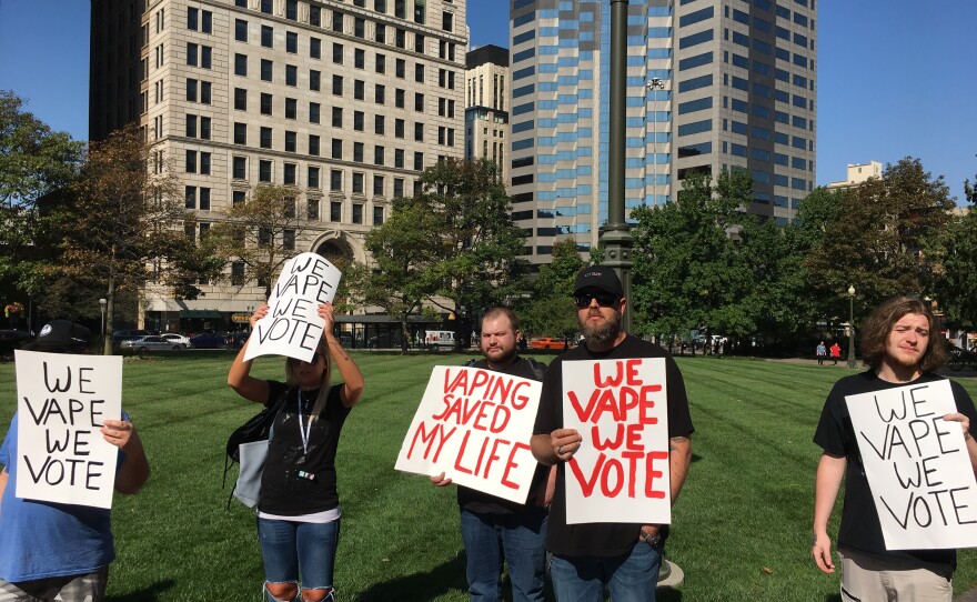 Homemade signs at pro-vaping rally