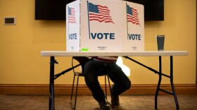 A voter fills out a ballot inside Summit County’s South Branch Library on Nov. 8, 2022, in Breckenridge.