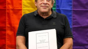 Robert Kesten, director of Stonewall National Museum, Archives, and Library, is photographed inside the library near the Ross Gallery where Beau McCall’s Rewind: History on Repeat is on display on Thursday, June 8, 2023. 
