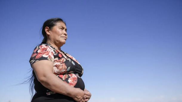Daniela Manea poses for a photo outside her home in Guymon, Okla., on Sunday, April 12, 2026. On the night of Aug. 5, 2023 at 3:39 P.M. DA drug task force officer Eldon Len Halliburton and Juan Mejia-Garcia’s vehicles collided on Highway 412, mile 33 in Guymon resulting in the death of Juan Mejia-Garcia (49) and Petronila Mejia-Ramos (8). Daniela Manea who was in the car with Juan and Petronila during the time of the incident was severely injured.