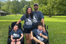 Catherine and Mike Ray with their two boys, Louie and JP.