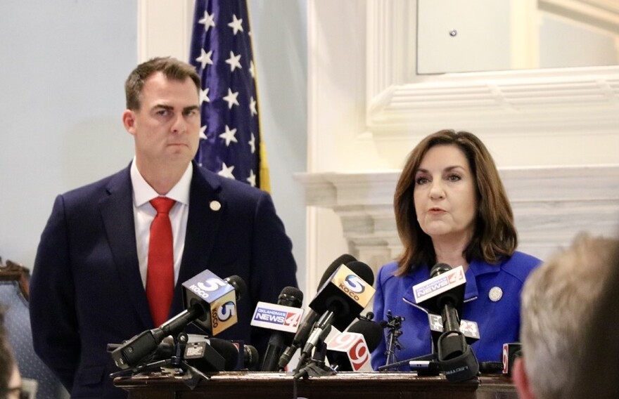 Gov. Kevin Stitt (left) and then-Superintendent Joy Hofmeister at a 2020 press conference. Stitt requested the audit on Hofmeister's department in 2021.