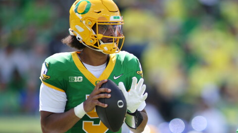 Oregon quarterback Dante Moore (5) looks to pass during the first half of an NCAA college football game against Boise State, Saturday, Sept. 5, 2026, in Eugene, Ore.