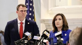 Gov. Kevin Stitt (left) and then-Superintendent Joy Hofmeister at a 2020 press conference. Stitt requested the audit on Hofmeister's department in 2021.