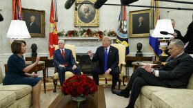 House Minority Leader Rep. Nancy Pelosi, D-Calif., Vice President Mike Pence, President Donald Trump, and Senate Minority Leader Chuck Schumer, D-N.Y., argue during a meeting in the Oval Office of the White House, Tuesday, Dec. 11, 2018, in Washington. 