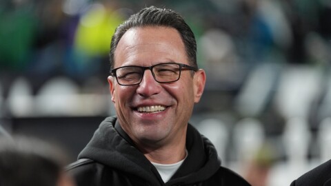 FILE - Pennsylvania Gov. Josh Shapiro watches warm ups before an NFL football game between the Philadelphia Eagles and the Detroit Lions on Sunday, Nov. 16, 2025, in Philadelphia. 