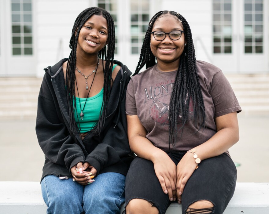 Makiyah Hicks and Jonetta Harrison in front of their high school, Duke Ellington School of the Arts, in Washington, D.C. They are finalists in this year's NPR Student Podcast Challenge for their entry "Loss and Transformation."