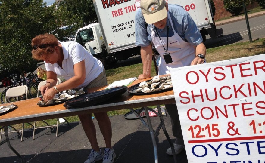 Connecticut's health exchange sent outreach workers to the Milford Oyster Festival to get people to sign up for health insurance.