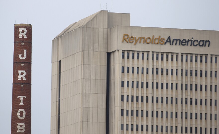 The headquarters of Reynolds American in downtown Winston-Salem, N.C.. Starting in January, workers there will no longer be allowed to smoke at their desks.