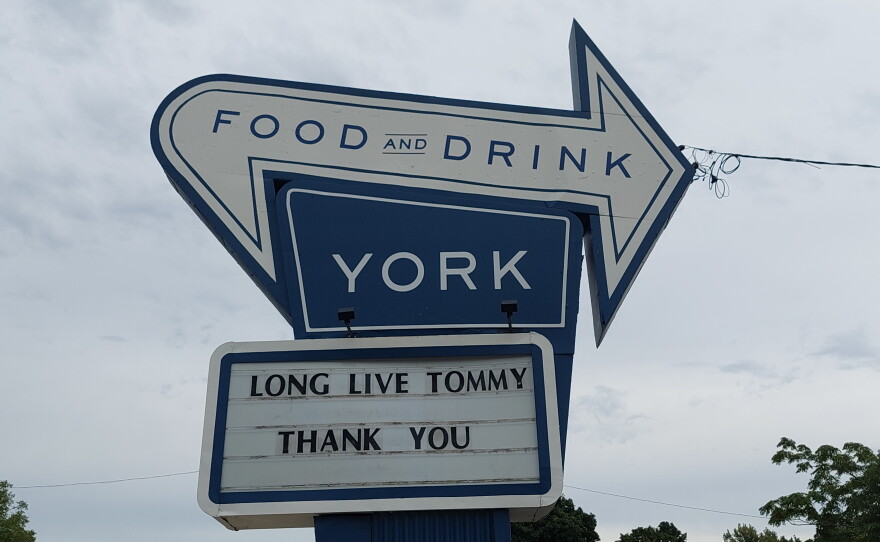 The sign for York Food and Drink memorializes its founder, Tommy York.