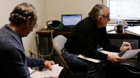 Bethel City Manager Peter Williams [left] and Former Finance Director Jim Chevigny [right] reviewing the FY2018 budget at Bethel City Hall on June 8, 2017. 
