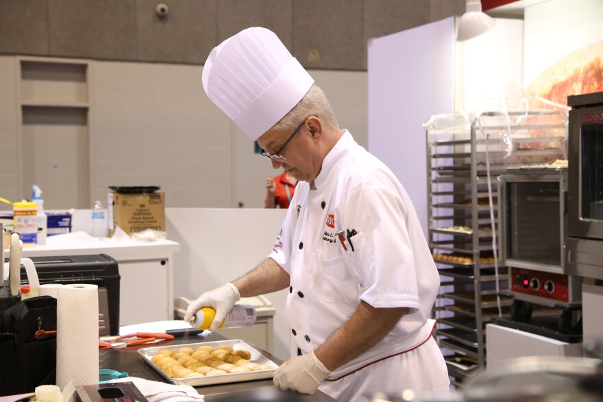A chef participating in the School Nutrition Association's 73rd Annual National Conference, which focuses on innovation in foods, beverages and tools for school cafeterias.