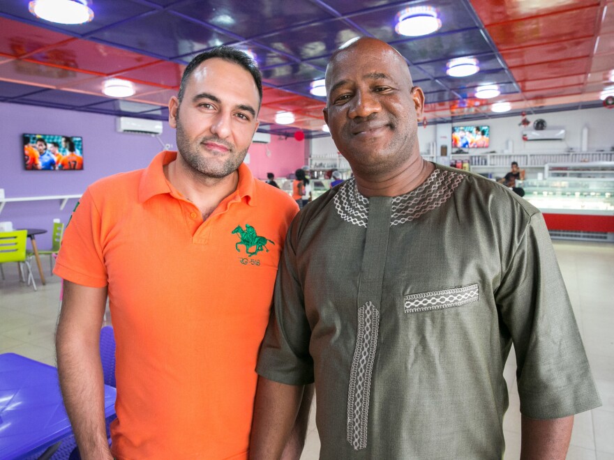 Mohamed Skaiki (left), from Lebanon, is the owner of Nice Cream — although he has brought in a Liberian partner, Ansu Kanneh.