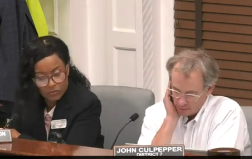 District 6 Commissioner Stephanie Johnson and District 7 Commissioner John Culpepper during the Feb. 4 meeting.