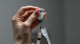 FILE - Lauren Ellenburg, a nurse, prepares a combination measles, mumps and rubella vaccine for a patient at Tiger Pediatrics in Easley, S.C., March 17, 2026.
