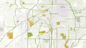 A screenshot of the Indiana Green City Mapper. Parks and trails in Monroe County are colored orange and green, respectfully.