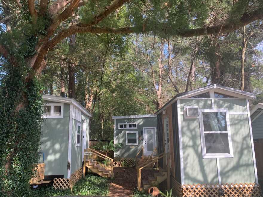 Krsna Balynas and her husband Govinda Carol of Alachua have 12 tiny homes in Alachua County listed on the Airbnb vacation rental website. Three of them are tucked away in an enclave a 10-minute drive from her house. (Veronica Nocera/WUFT News)