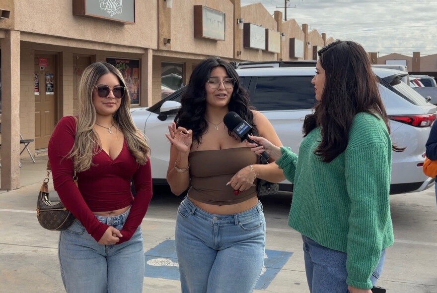 Elia Garcia on the left, and Aileen Torres to the right next to KAWC reporter.