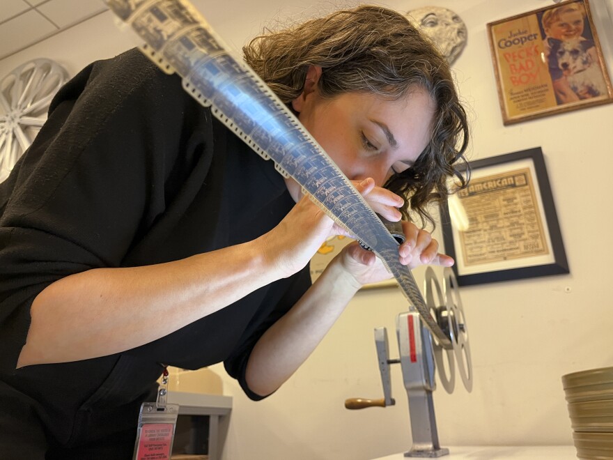 Collection Technician Courtney Holschuh inspects a 35-millimeter nitrate film reel of French filmmaker Georges Méliès' "Gugusse and the Automaton," a silent short from 1897 recently donated to the Library, at the National Audio-Visual Conservation Center in Culpeper, Virginia, January 12, 2026.