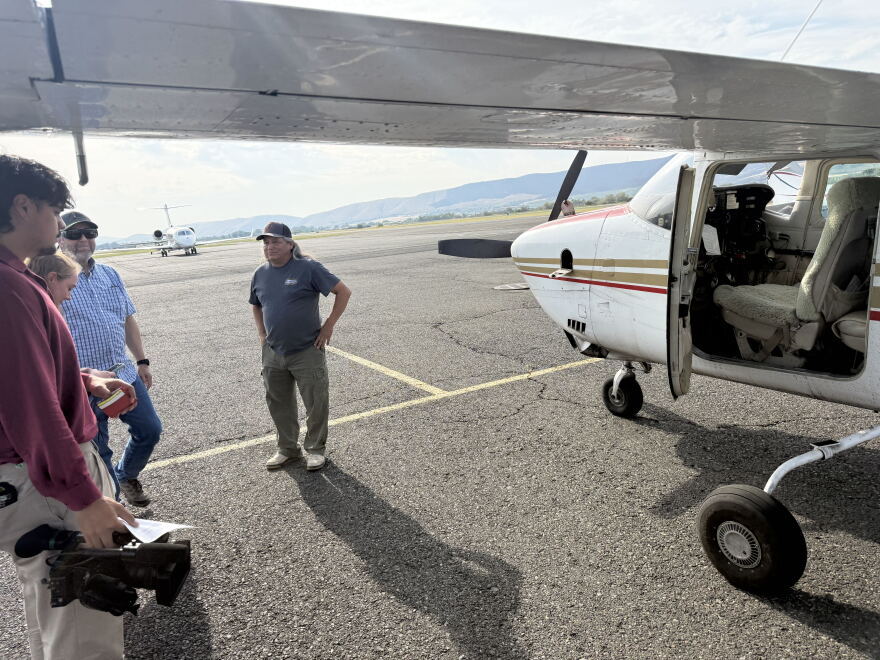 Joe Blodgett, a fisheries project manager with Yakama Nation Fisheries, waits with others to board the Ecoflight over the basin, to see the effects of the drought from the air.