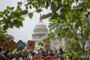 Demonstrators protest prior to a news conference regarding the pending passage of the One Big Beautiful Bill Act at the Capitol, Tuesday, June 3, 2025, in Washington. (AP Photo/Rod Lamkey, Jr.)