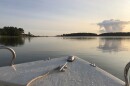 Dawn is seen from the bow of the boat Ahoya in Chesapeake Bay near Smith Point Marina in Reedville, Va., on Friday, Sept. 10, 2021.