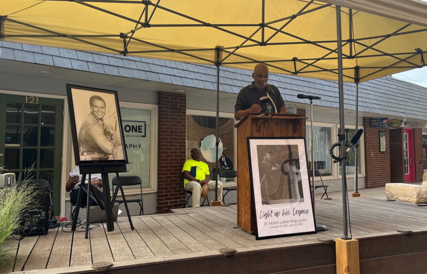 Penn State Professor Keith Gelyard pauses during his speech in Dr. Martin Luther King Jr. Plaza on Monday, Aug. 28, 2023 in State College, Pa.