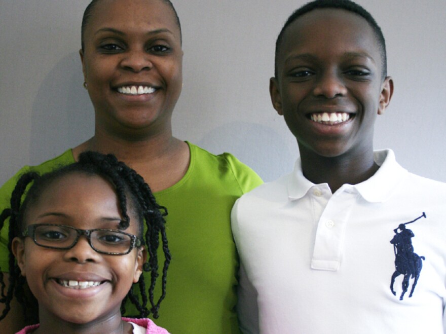 Talana and Willie with their mother, Felicia Banks, who served in Iraq in 2005.