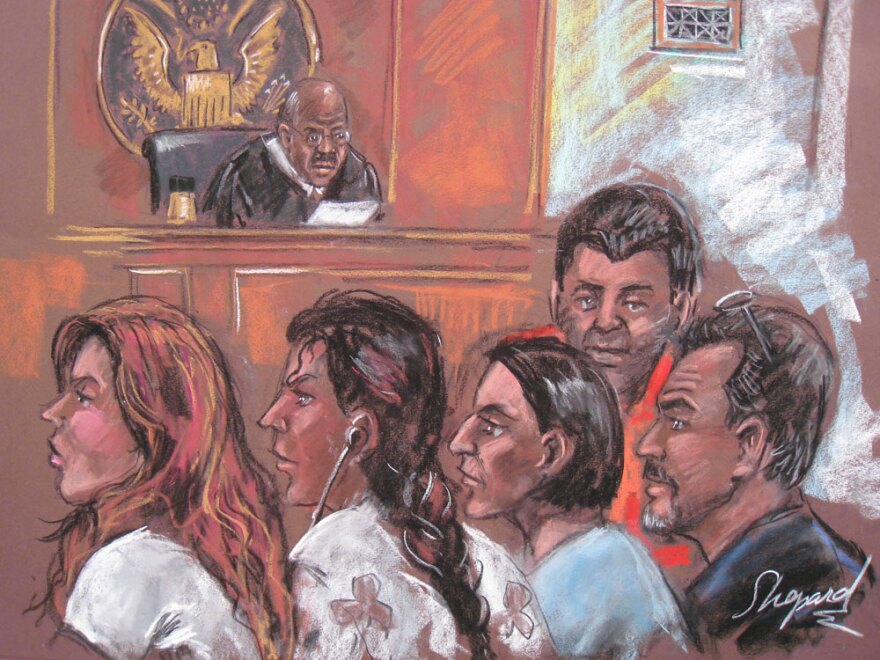 This New York courtroom drawing from June 28 shows five of the 10 Russian spy suspects arrested in the United States.