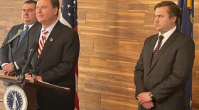 Republican Indiana Attorney General Todd Rokita, center, announces at the County-City Building that he's suing against St. Joseph County, alleging its jail is violating a new state law by not cooperating with federal immigration officials. Sheriff Bill Redman denied the allegations.