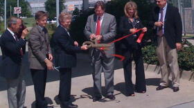 Members of the Oklahoma Turnpike Authority and the Tulsa Airport Authority cut the ribbon on the new Pike Pass lane at Tulsa International.