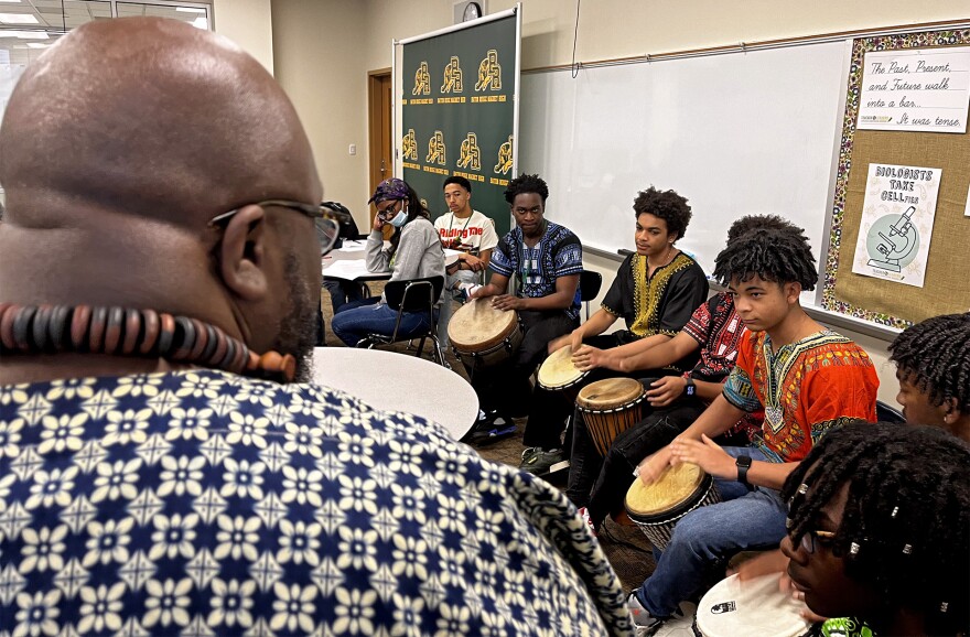 Students in Baton Rouge Magnet High School’s music program perform an African drum circle on djembe drums during an AP African American Studies class on March 2, 2023.