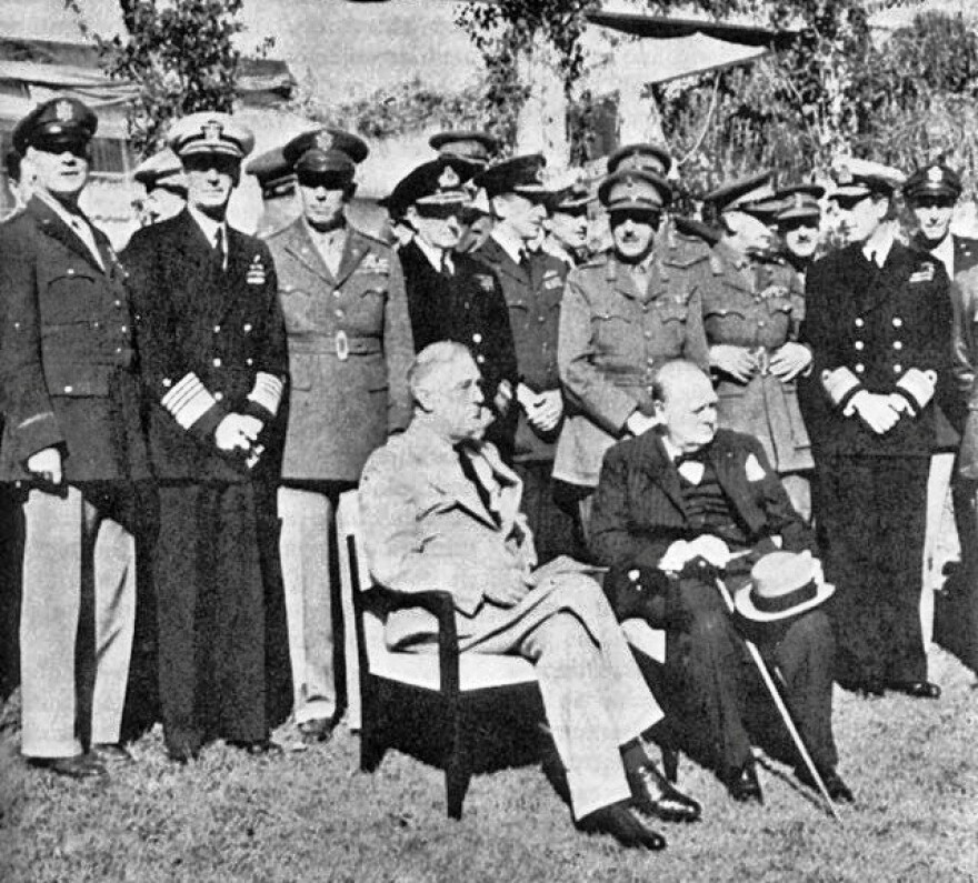 U.S. President Franklin D. Roosevelt with U.K. Prime Minister Winston Churchill in Casablanca. Both are seated.