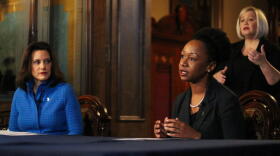 Dr. Joneigh Khaldun, far right, at a press conference during the pandemic. 