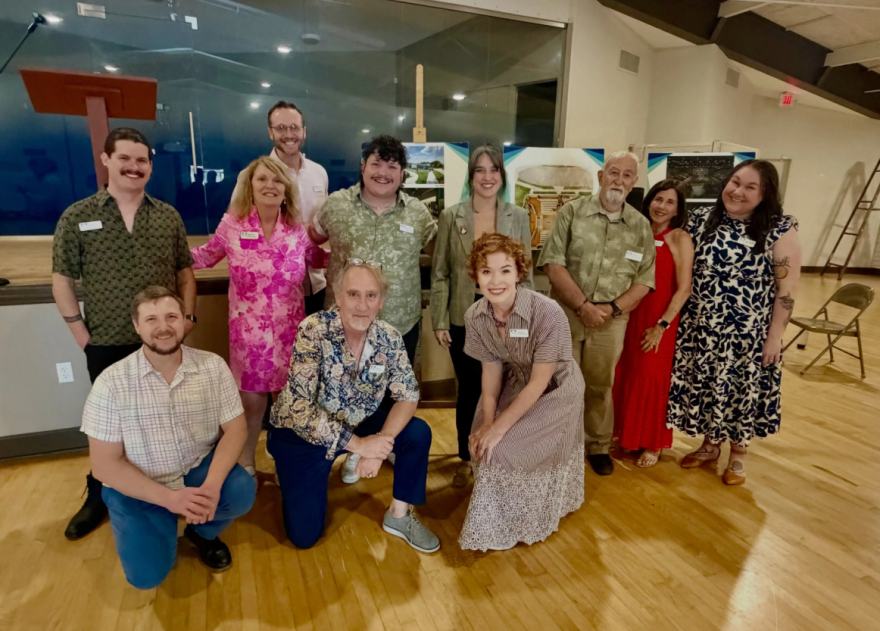 Group of people pose for a photo 